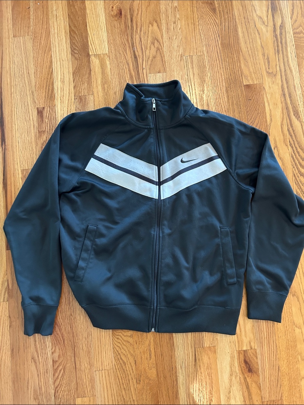Nike Black Track Jacket with Silver Chevron Accents